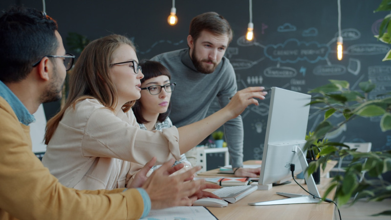 Team reviewing an AI workflow together in an office setting